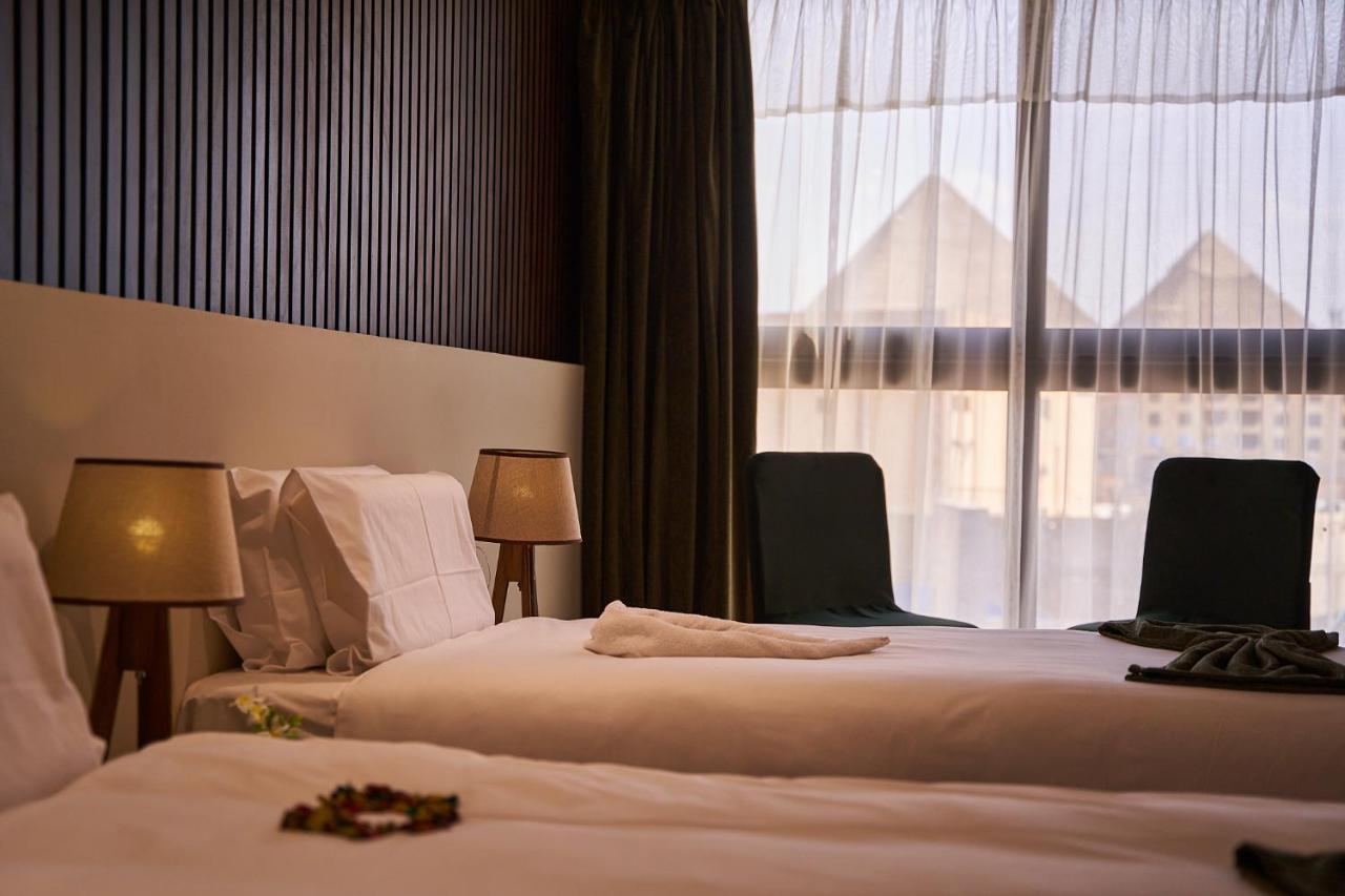 New Pyramid Front Hotel Al Kawm al Akhdar Bagian luar foto